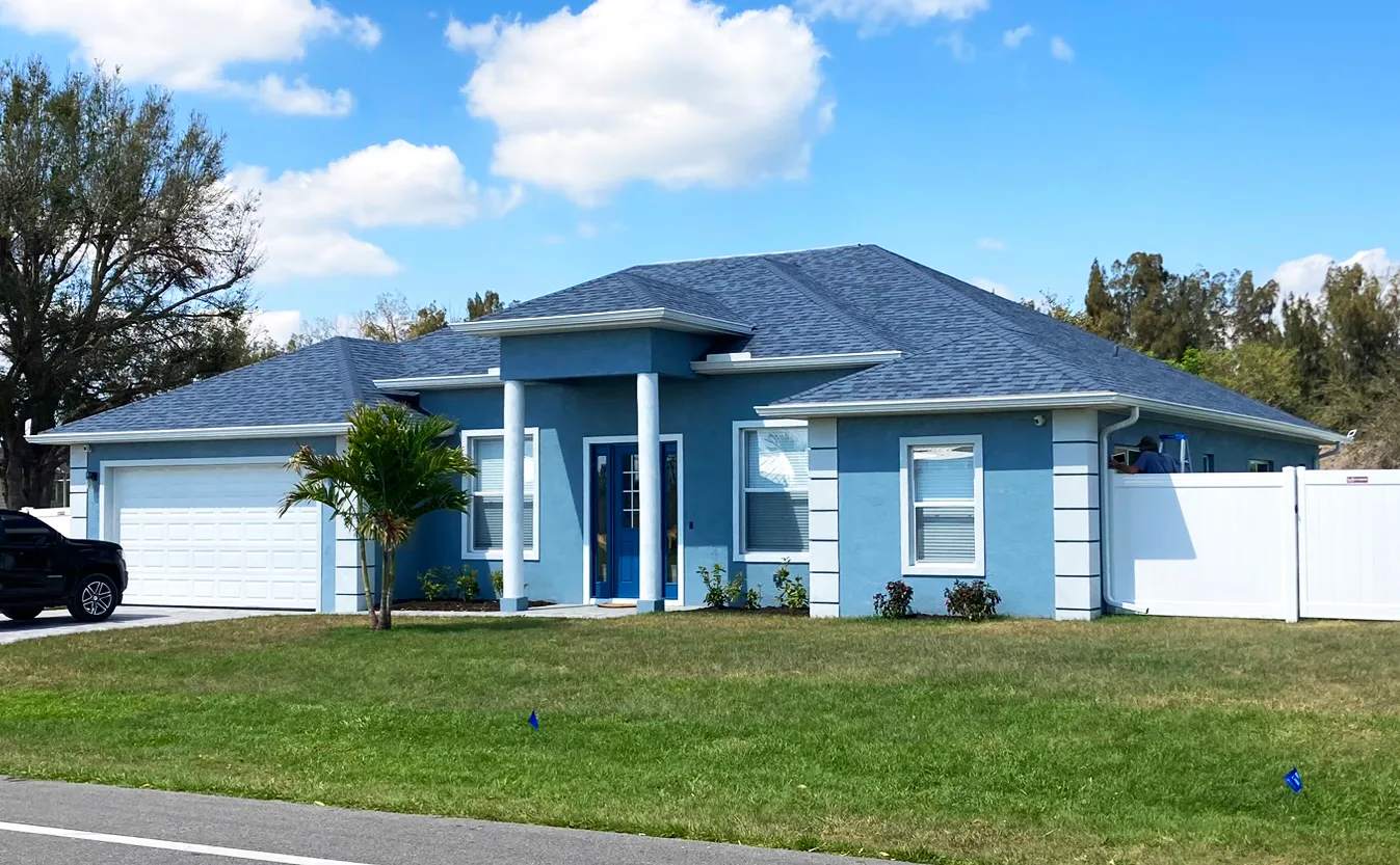 Alexandria custom home exterior with blue facade